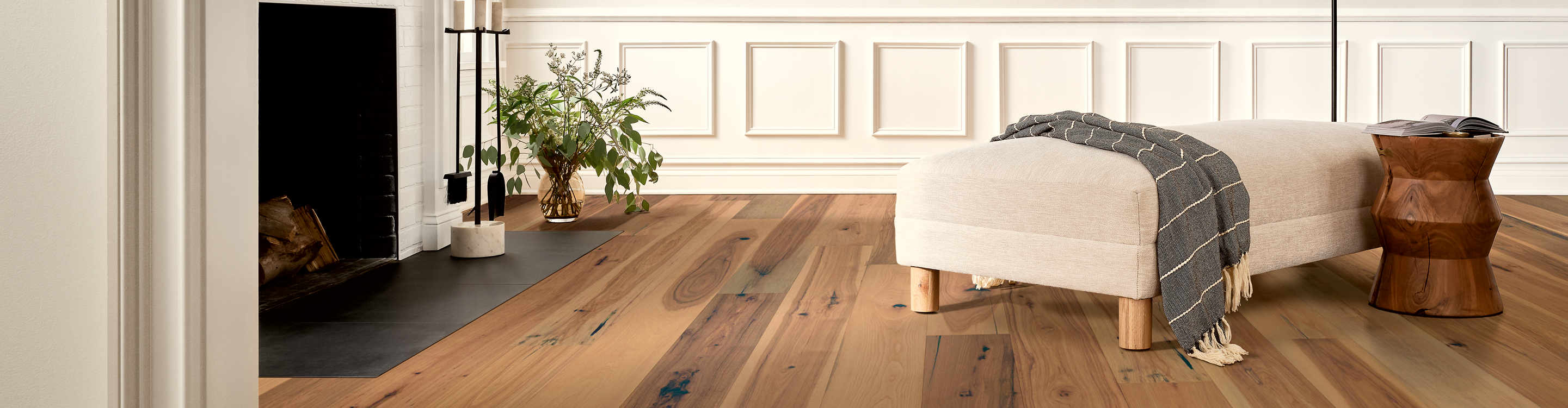 Living room with hardwood flooring and fireplace