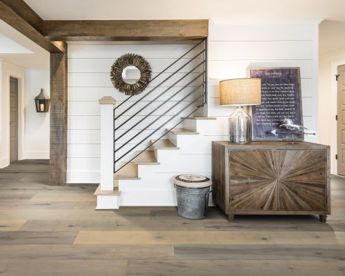BelleLuxe flooring in white room with stairs. 